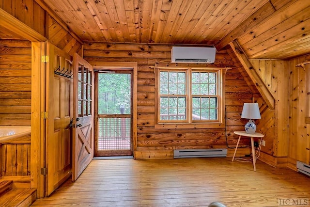 interior space with baseboard heating, light hardwood / wood-style flooring, a wall unit AC, wood ceiling, and rustic walls