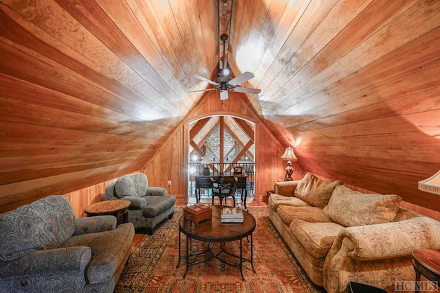 living room with vaulted ceiling, wooden walls, ceiling fan, and wood ceiling