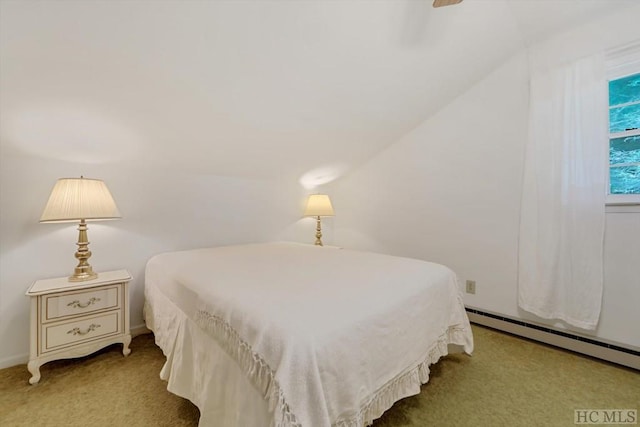 carpeted bedroom featuring ceiling fan and baseboard heating