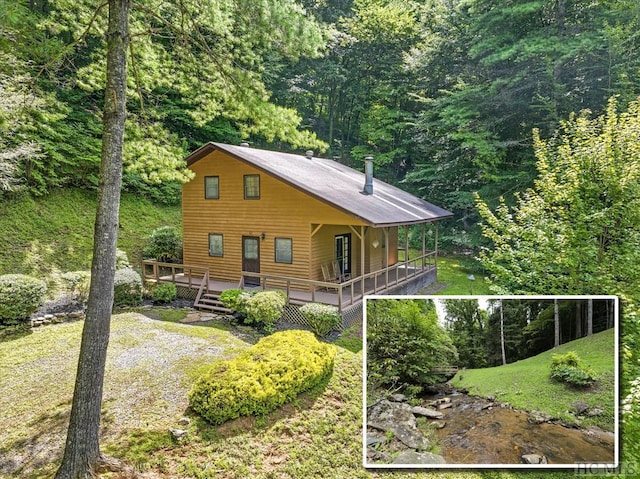 view of home's exterior featuring a deck