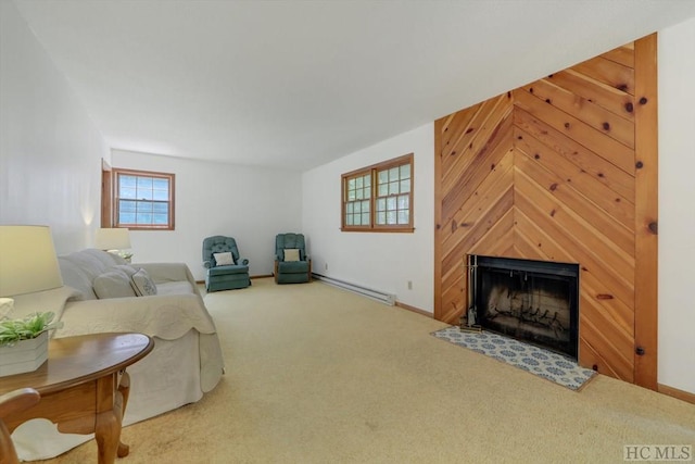 living room featuring baseboard heating and carpet flooring