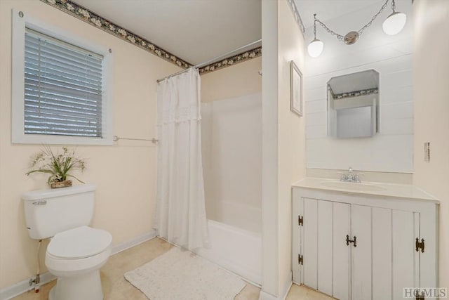 full bathroom featuring shower / tub combo with curtain, toilet, and vanity