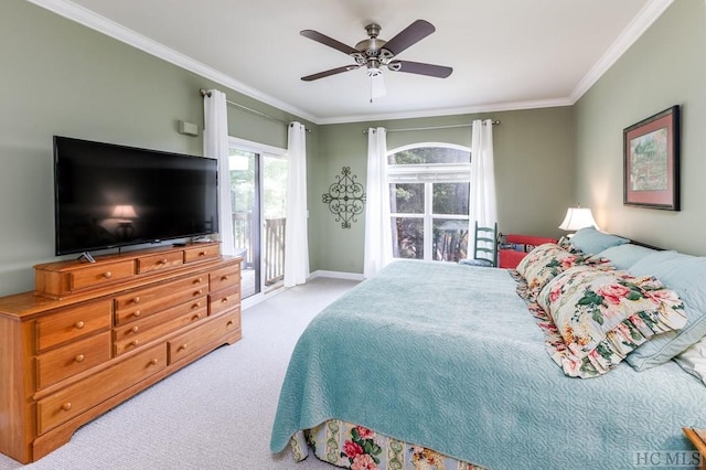 carpeted bedroom with ceiling fan, access to outside, and crown molding