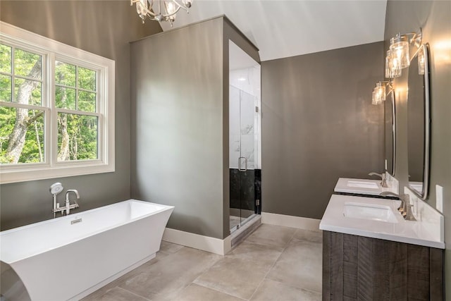 343 Ledgeview Rd, Cashiers, NC 28717 - full bathroom with a soaking tub, double vanity, a shower stall, and a chandelier
