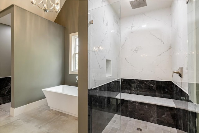 343 Ledgeview Rd, Cashiers, NC 28717 - full bath with marble tiled floors, a soaking tub, a marble finish shower, and a chandelier