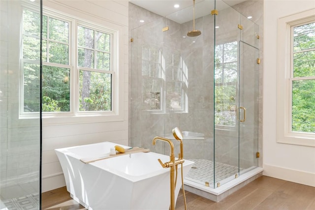 343 Ledgeview Rd, Cashiers, NC 28717 - full bath featuring wood finished floors, a stall shower, and a freestanding tub