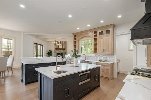 343 Ledgeview Rd, Cashiers, NC 28717 - kitchen featuring appliances with stainless steel finishes, open shelves, exhaust hood, backsplash, and a chandelier