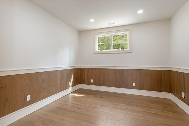 343 Ledgeview Rd, Cashiers, NC 28717 - empty room featuring wood finished floors, wainscoting, recessed lighting, and wooden walls