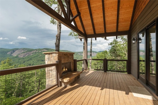 343 Ledgeview Rd, Cashiers, NC 28717 - deck featuring a stone fireplace and a mountain view