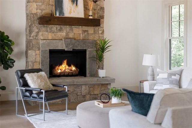343 Ledgeview Rd, Cashiers, NC 28717 - living room with wood finished floors, a fireplace, and healthy amount of natural light