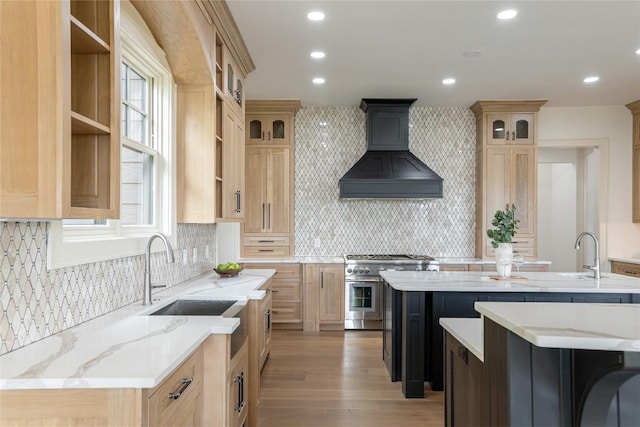 343 Ledgeview Rd, Cashiers, NC 28717 - kitchen with premium range hood, high end range, a kitchen island, tasteful backsplash, and recessed lighting