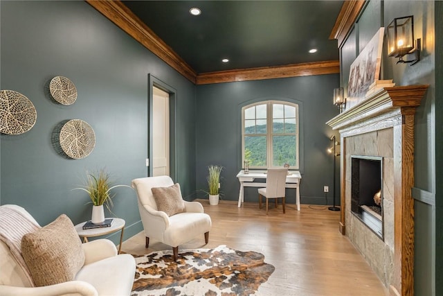 343 Ledgeview Rd, Cashiers, NC 28717 - sitting room with light wood-style flooring, a high end fireplace, recessed lighting, and crown molding