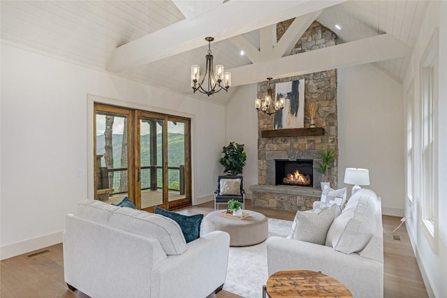 343 Ledgeview Rd, Cashiers, NC 28717 - living room featuring a chandelier, wood finished floors, a fireplace, and recessed lighting