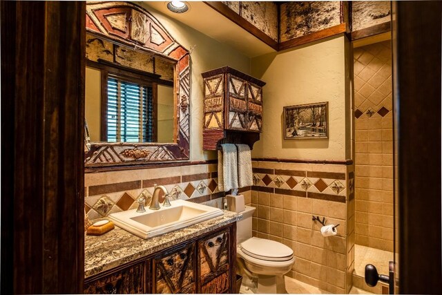 1090 Zeb Alley Rd, Cashiers, NC 28717 - bathroom featuring wainscoting, vanity, and tile walls