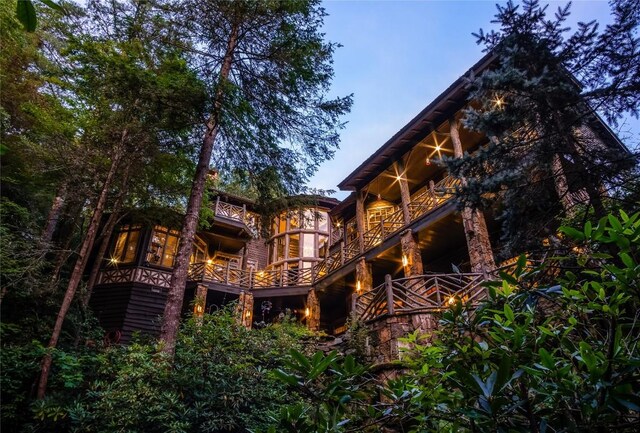 1090 Zeb Alley Rd, Cashiers, NC 28717 - rear view of property featuring a balcony