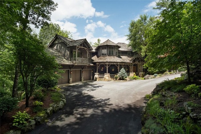 1090 Zeb Alley Rd, Cashiers, NC 28717 - view of front of house with driveway and an attached garage