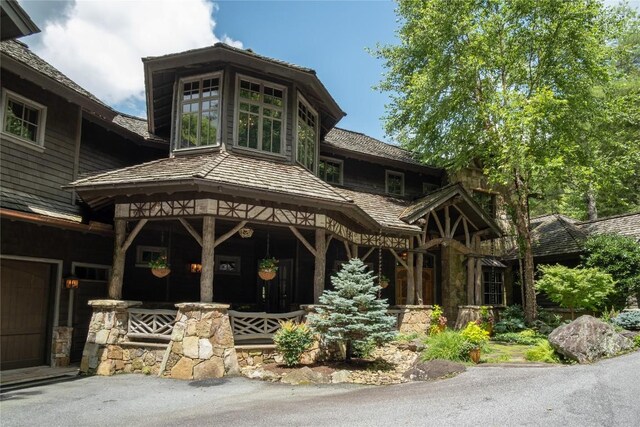 1090 Zeb Alley Rd, Cashiers, NC 28717 - view of front facade with a porch