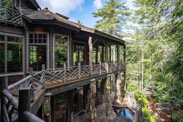 1090 Zeb Alley Rd, Cashiers, NC 28717 - view of home's exterior with a wooden deck and a patio area