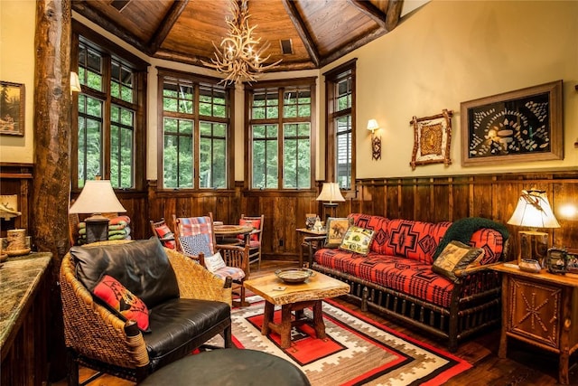 1090 Zeb Alley Rd, Cashiers, NC 28717 - sitting room featuring a wood ceiling with exposed beams, a chandelier, wainscoting, wood-type flooring, and wood walls