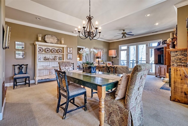 dining space featuring recessed lighting, baseboards, light carpet, and crown molding