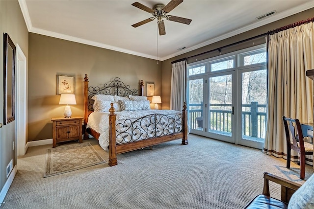 bedroom with crown molding, access to outside, baseboards, and visible vents