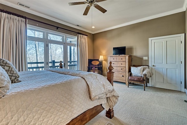 bedroom with a ceiling fan, carpet, visible vents, crown molding, and access to outside