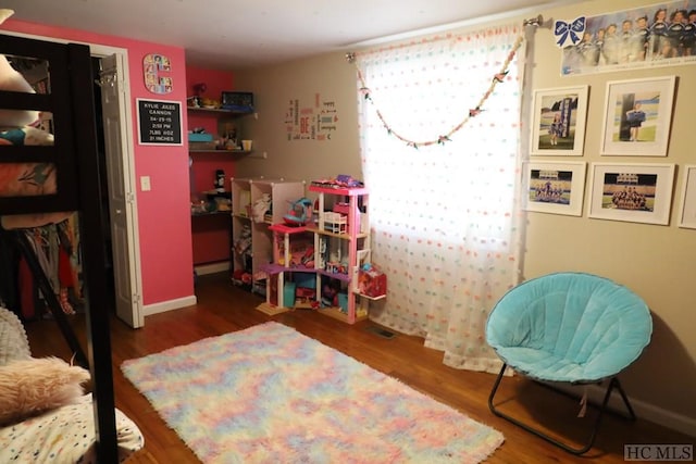 bedroom featuring hardwood / wood-style floors