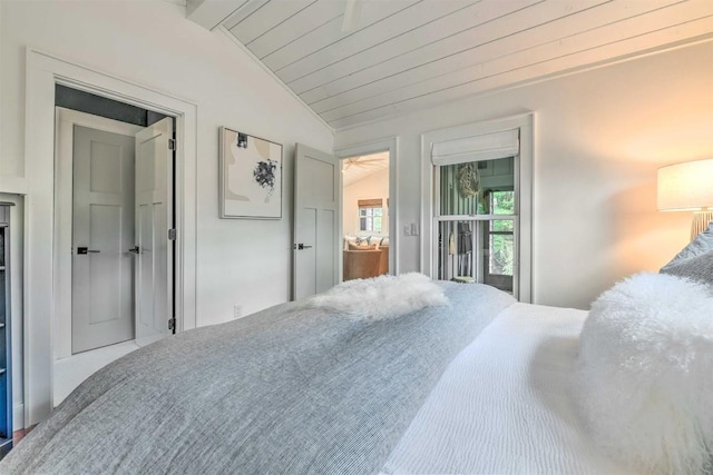 bedroom with wood ceiling and lofted ceiling with beams