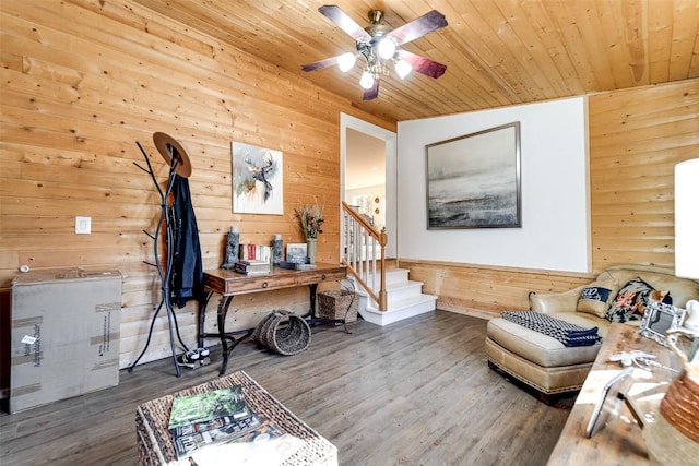 interior space with wood ceiling, wooden walls, dark hardwood / wood-style floors, and vaulted ceiling