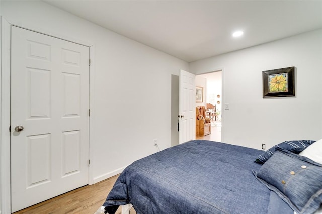 bedroom featuring hardwood / wood-style floors