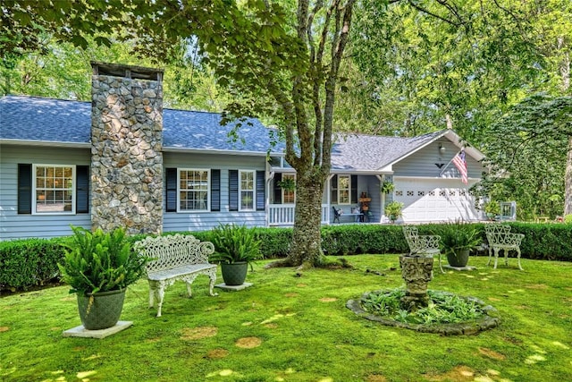 236 Hemlock Woods Dr, Highlands, NC 28741 - view of front of house with a front lawn, a garage, and a shingled roof