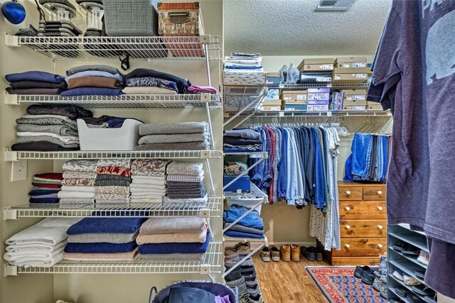 236 Hemlock Woods Dr, Highlands, NC 28741 - spacious closet featuring wood finished floors