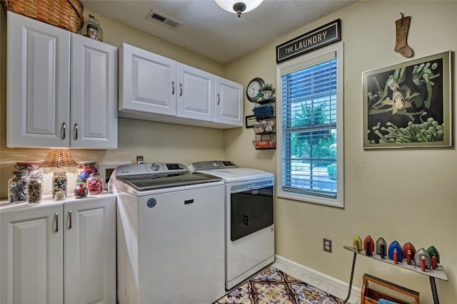 236 Hemlock Woods Dr, Highlands, NC 28741 - laundry room with cabinet space, washing machine and dryer, and light tile patterned floors