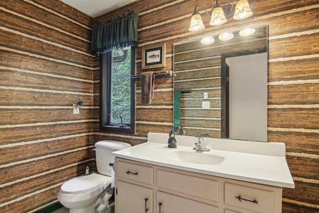 383 Wild Game Trl Unit D, Sapphire, NC 28774 - bathroom featuring wood walls, toilet, and vanity