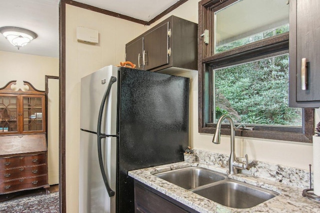 383 Wild Game Trl Unit D, Sapphire, NC 28774 - kitchen with a sink, freestanding refrigerator, healthy amount of natural light, and dark brown cabinetry