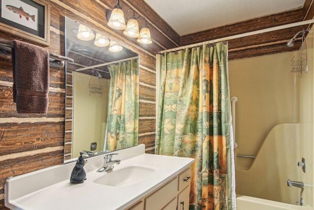 383 Wild Game Trl Unit D, Sapphire, NC 28774 - bathroom featuring wooden walls, shower / bathtub combination with curtain, and vanity