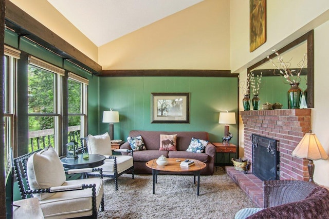 383 Wild Game Trl Unit D, Sapphire, NC 28774 - living room featuring high vaulted ceiling and a fireplace