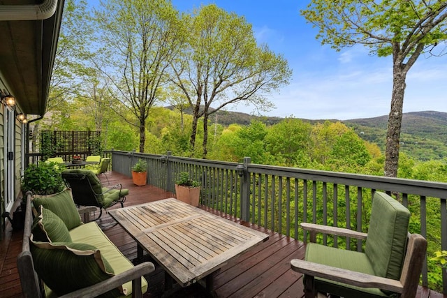 wooden terrace with a mountain view
