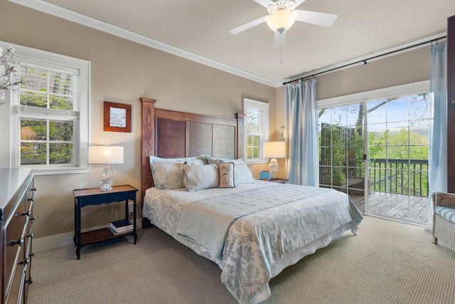 bedroom featuring light carpet, access to exterior, crown molding, multiple windows, and baseboards