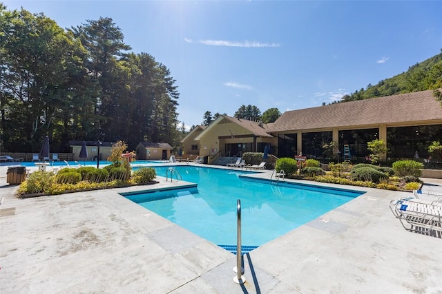 community pool featuring a patio