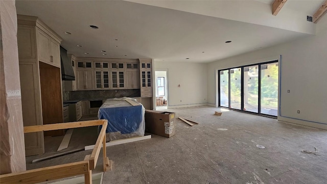 living room with baseboards and recessed lighting