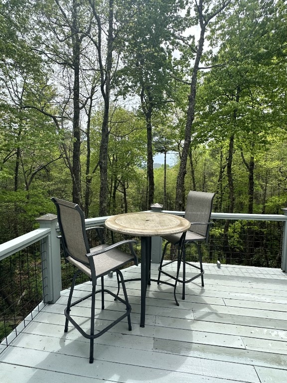 deck with outdoor dining space