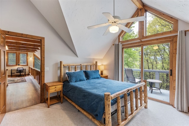 bedroom featuring lofted ceiling with beams, a ceiling fan, light carpet, and access to exterior