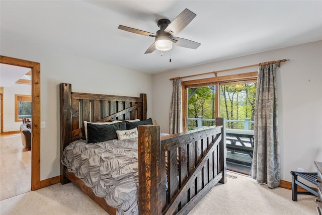 bedroom with baseboards, light carpet, and ceiling fan