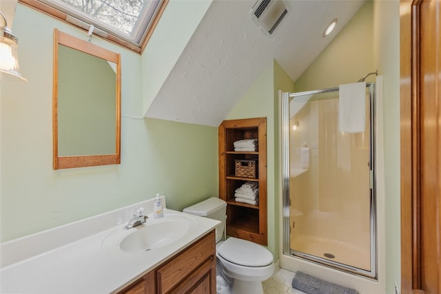 full bath with visible vents, vanity, lofted ceiling, toilet, and a stall shower