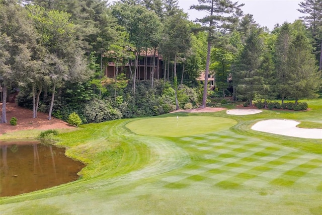 123 Staircase Falls Rd, Sapphire, NC 28774 - view of home's community featuring golf course view and a putting area