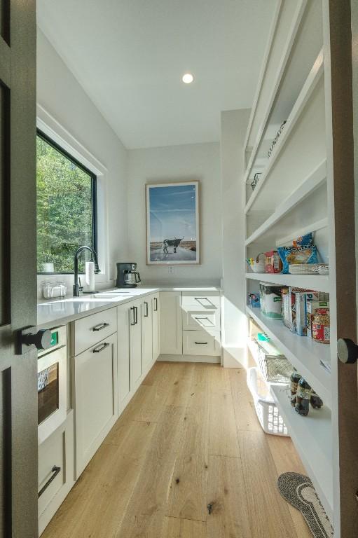 storage area featuring a sink