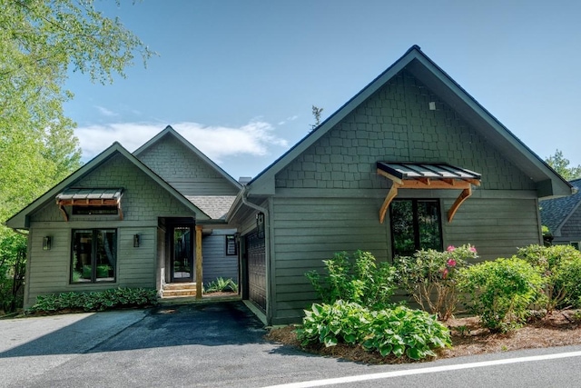 view of front of home with a standing seam roof