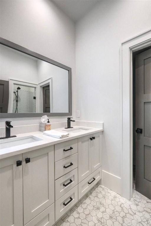 full bathroom with double vanity