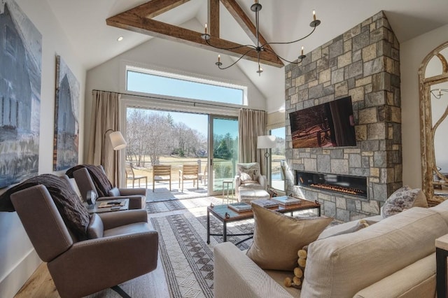 living area with a stone fireplace, beam ceiling, wood finished floors, and high vaulted ceiling